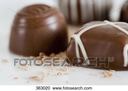 Handmade chocolates on a plate View Large Photo Image Stock Image - Handmade chocolates on a plate. Fotosearch