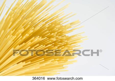 Uncooked spaghetti View Large Photo Image Stock Photograph - Uncooked spaghetti. Fotosearch