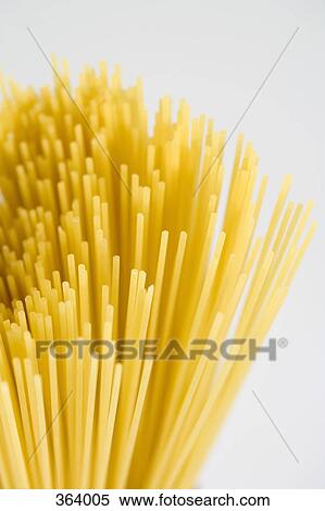 Stock Photography - Uncooked spaghetti. Fotosearch