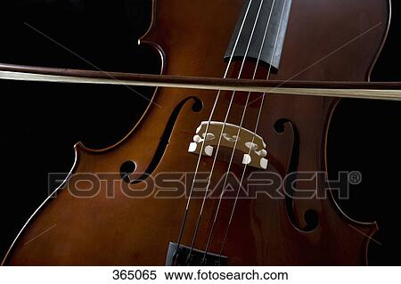 Cello with bow View Large Photo Image Stock Photography - Cello with bow. Fotosearch