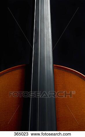 Stock Image - Detail of a cello. Fotosearch