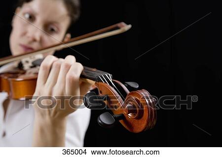 Picture - Woman playing a violin. Fotosearch