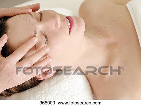 Woman receiving a massage at a beauty spa View Large Photo Image Stock Photo - Woman receiving a massage at a beauty spa. Fotosearch