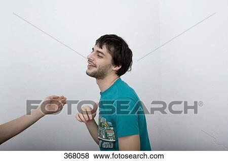 Friends messing about together View Large Photo Image Stock Photo - Friends messing about together. Fotosearch