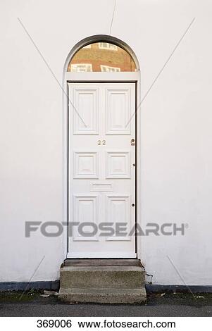 White wooden door of a house View Large Photo Image Stock Photograph - White wooden door of a house. Fotosearch