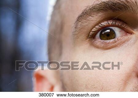 Close-up of a man’s eye View Large Photo Image Stock Photo - Close-up of a man’s eye. Fotosearch