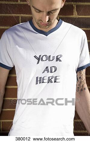 Man wearing a t-shirt with handwritten text View Large Photo Image Stock Image - Man wearing a t-shirt with handwritten text. Fotosearch