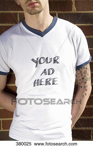 Man wearing a t-shirt with handwritten text View Large Photo Image Stock Photography - Man wearing a t-shirt with handwritten text. Fotosearch