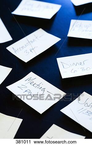 Adhesive notes with handwritten reminders stuck on a desk View Large Photo Image Stock Image - Adhesive notes with handwritten reminders stuck on a desk. Fotosearch