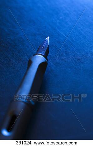 Fountain pen on a desk View Large Photo Image Picture - Fountain pen on a desk. Fotosearch