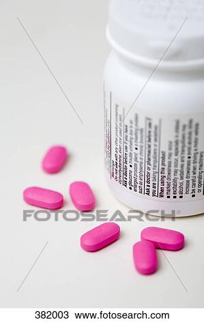 粉红色 药丸 同时 药瓶子图片银行 382003 Fotosearch
