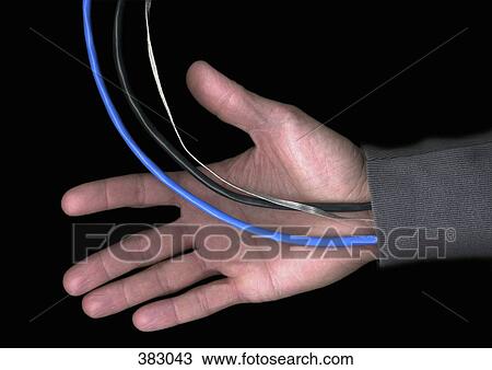 Man with cables and wires extending from his sleeve View Large Photo Image Stock Image - Man with cables and wires extending from his sleeve. Fotosearch