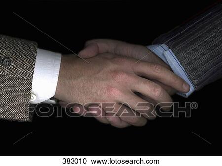 Two businessmen shaking hands View Large Photo Image Stock Image - Two businessmen shaking hands. Fotosearch