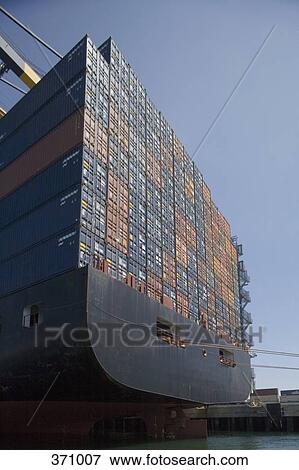 Cargo containers stacked on a ship View Large Photo Image Stock Photo - Cargo containers stacked on a ship. Fotosearch