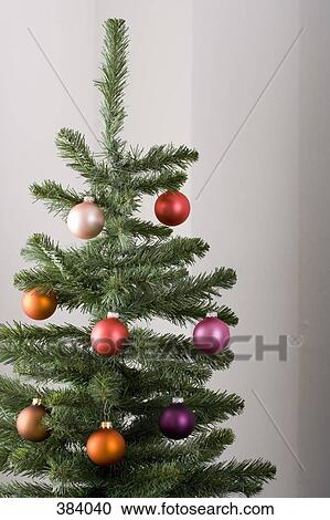 Stock Image - High section of an artificial Christmas tree. Fotosearch
