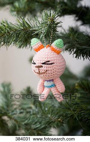 Ornament hanging on Christmas tree View Large Photo Image Stock Image - Ornament hanging on Christmas tree. Fotosearch