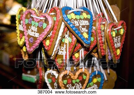 Heart-shaped gingerbread cookies at a Christmas market View Large Photo Image Picture - Heart-shaped gingerbread cookies at a Christmas market. Fotosearch