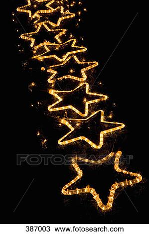 Row of star-shaped lights View Large Photo Image Stock Image - Row of star-shaped lights. Fotosearch
