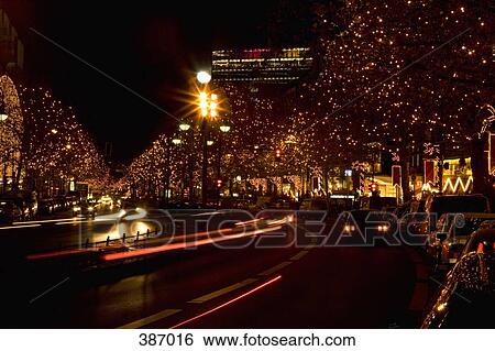 Stock Photograph - Rows of trees with Christmas lights along Kurfurstendamm, Berlin, Germany. Fotosearch