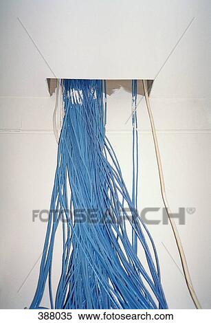 Cables hanging from a duct in the ceiling View Large Photo Image Stock Photography - Cables hanging from a duct in the ceiling. Fotosearch