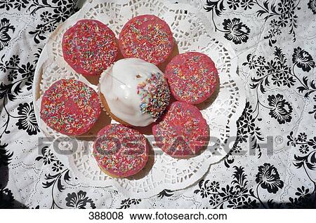 Plate of biscuits and cupcakes View Large Photo Image Stock Photo - Plate of biscuits and cupcakes. Fotosearch