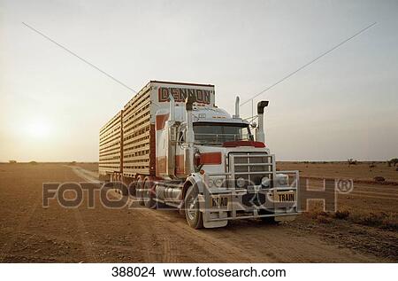Picture - Semi-truck in a remote landscape. Fotosearch