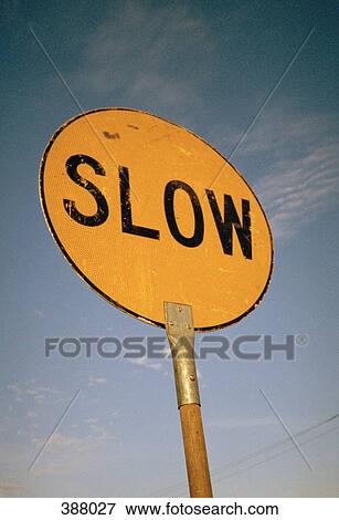 Stock Photo - "Slow" road sign. Fotosearch