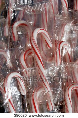 Candy canes in plastic packaging View Large Photo Image Stock Image - Candy canes in plastic packaging. Fotosearch