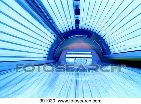 Illuminated tanning bed View Large Photo Image Stock Image - Illuminated tanning bed. Fotosearch