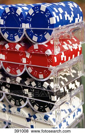Rows of gambling chips arranged in trays View Large Photo Image Stock Photo - Rows of gambling chips arranged in trays. Fotosearch
