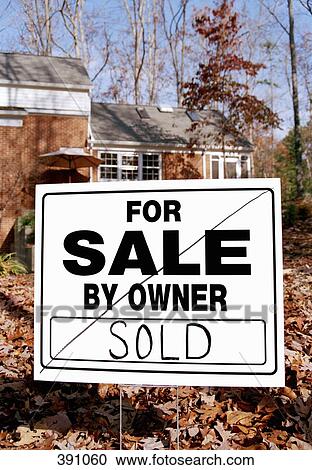 "Sold" sign in front of a house View Large Photo Image Stock Image - "Sold" sign in front of a house. Fotosearch