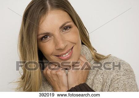 Stock Photo - Portrait of a woman wearing turtleneck sweater. Fotosearch
