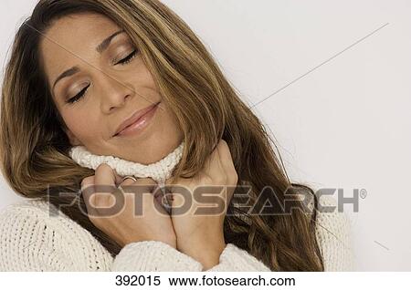 Stock Photography - Portrait of a woman wearing turtleneck sweater. Fotosearch