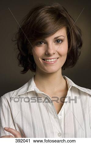 Portrait of woman smiling View Large Photo Image Stock Image - Portrait of woman smiling. Fotosearch