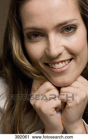 Portrait of woman smiling View Large Photo Image Stock Image - Portrait of woman smiling. Fotosearch