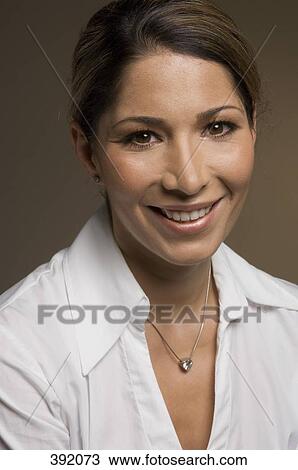Portrait of woman smiling View Large Photo Image Stock Image - Portrait of woman smiling. Fotosearch