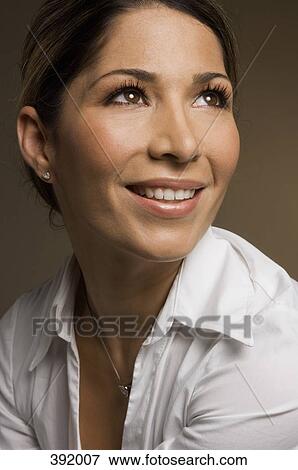 Stock Photo - Portrait of woman smiling. Fotosearch