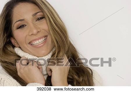 Stock Photo - Portrait of woman smiling. Fotosearch