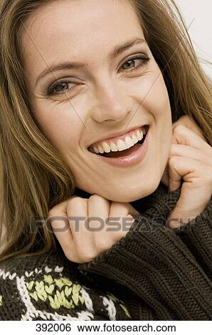 Stock Photograph - Portrait of woman smiling. Fotosearch