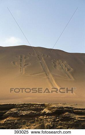Stock Photography - "Candelabro" inscription on a cliff, Ballestas Islands, Paracas, Peru. Fotosearch