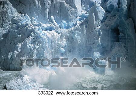 Ice breaking off a glacier View Large Photo Image Stock Image - Ice breaking off a glacier. Fotosearch