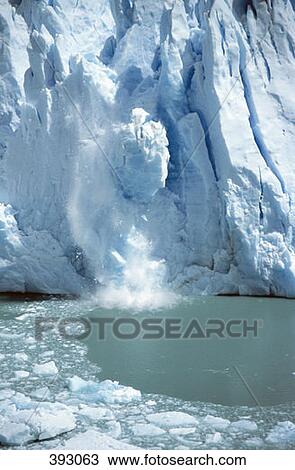 Stock Image - Ice breaking off a glacier. Fotosearch