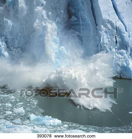 Ice breaking off a glacier View Large Photo Image Stock Photo - Ice breaking off a glacier. Fotosearch