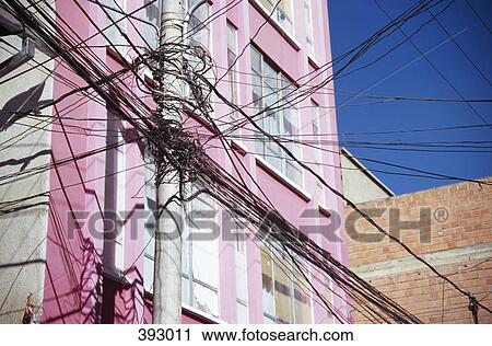 Intersection of power lines in front of buildings, La Paz, Bolivia View Large Photo Image Stock Image - Intersection of power lines in front of buildings, La Paz, Bolivia. Fotosearch