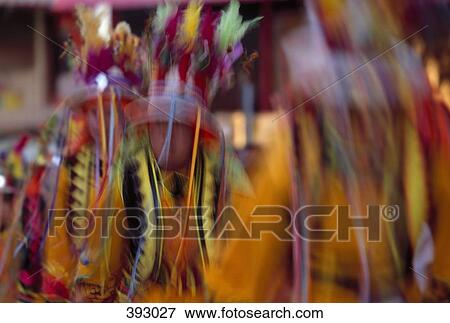 Men dancing in traditional clothing and feather headdresses View Large Photo Image Stock Photo - Men dancing in traditional clothing and feather headdresses. Fotosearch