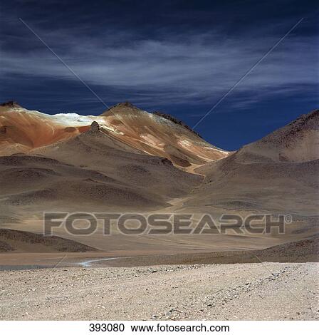 Stock Image - Mountains in barren landscape, Andes, Bolivia. Fotosearch