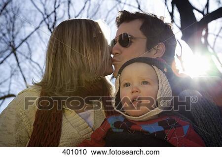 Family in the park View Large Photo Image Stock Image - Family in the park. Fotosearch