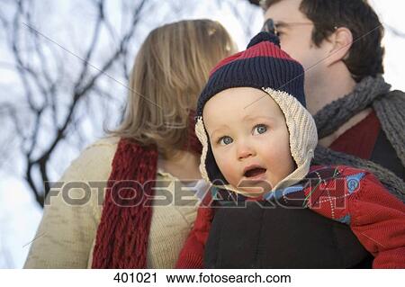Family with a young boy in the park View Large Photo Image Stock Image - Family with a young boy in the park. Fotosearch