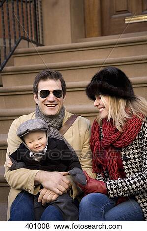 Family with one child sitting on steps View Large Photo Image Stock Photo - Family with one child sitting on steps. Fotosearch