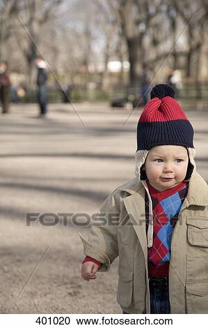 Young boy in the park View Large Photo Image Stock Image - Young boy in the park. Fotosearch